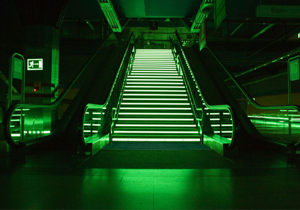 Glow in the dark markings used on escalator in metro station