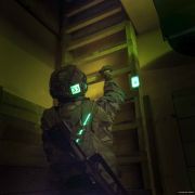 Chemical light on the back of a soldier