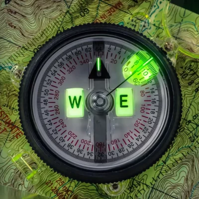Tritium compass lighting up on a map