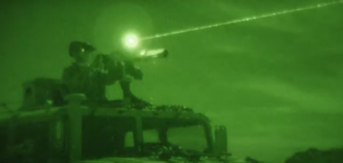 Betalight B20 Green Laser Pointer mounted on a weapon system