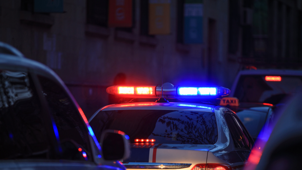 Police car with emergency lights on