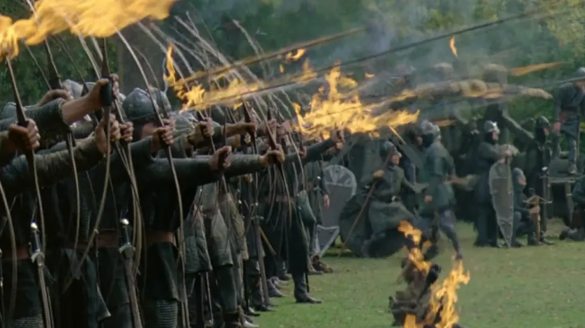 A group of archers shooting flaming arrows