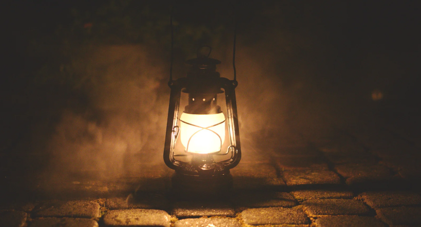 A candle gas lamp on the floor