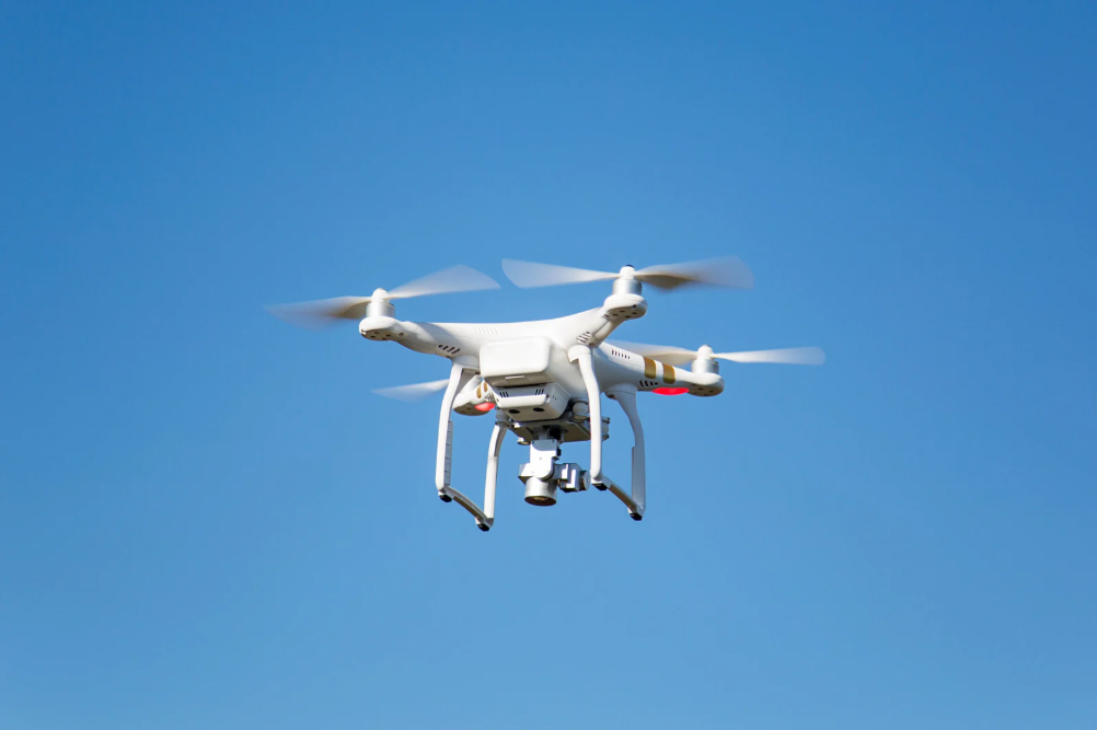 drone in the sky with lights
