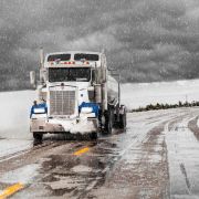the rectangular headlights on a snowy truck
